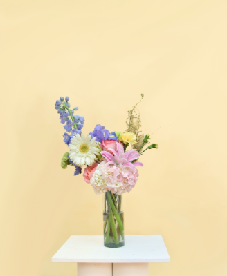 Contrata el servicio de Bouquet Base Cilindro de Vidrio Color Aurora en Partymax. Imagen #2