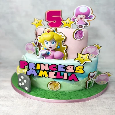 Contrata el servicio de Torta Princesa Peach con apliques 2 Niveles en Partymax. Imagen #1