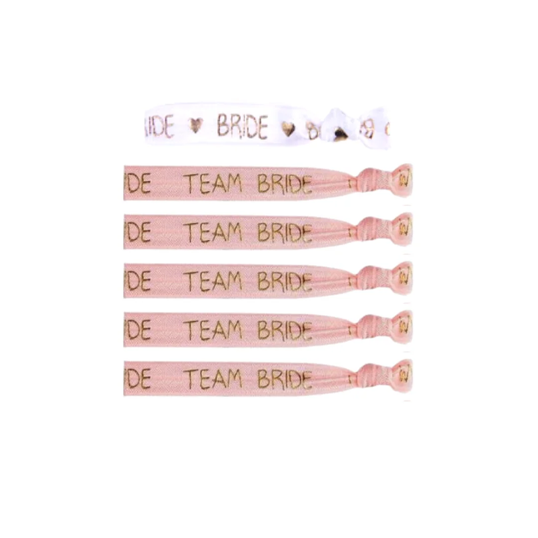 Compra Set de Manillas Bride To Be* 6 Und Rosadas en Partymax. Bogotá. Imagen #1.